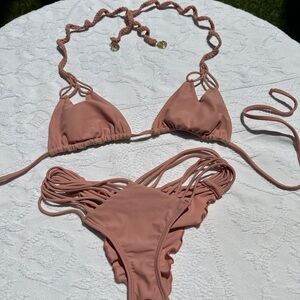 Luli Fama Pink Blush Cut Out top and strappy high leg bottom